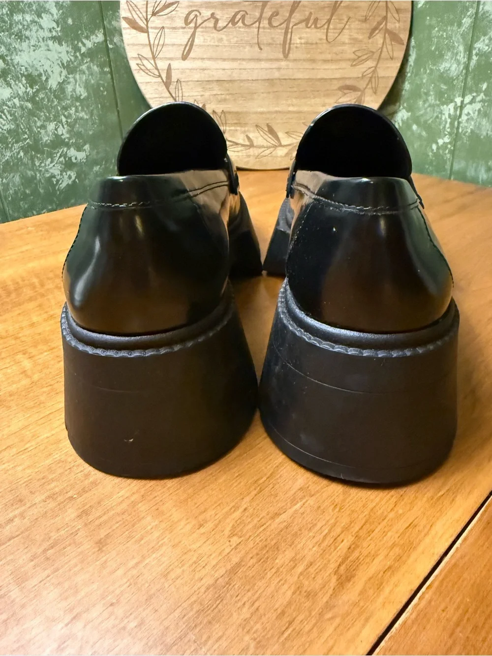 Coach polished black